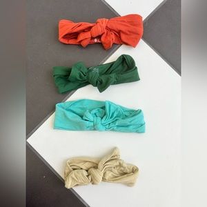 4 Kyte baby bows - orange, green, aqua, tan